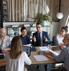 Business Meeting at Small Table