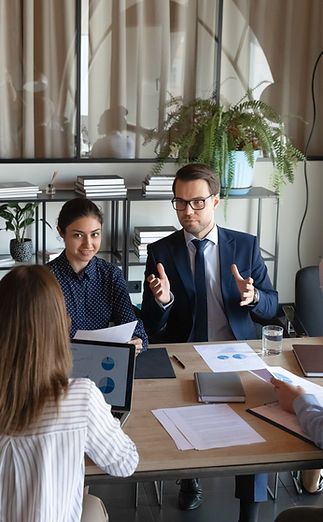 Business Meeting at Small Table