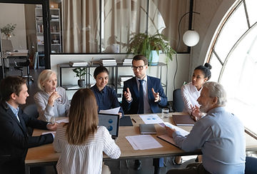 Business Meeting at Small Table