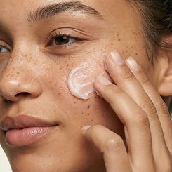 Applying Face Cream