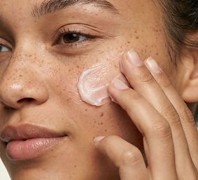 Applying Face Cream