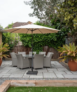 round outdoor table outside summer house