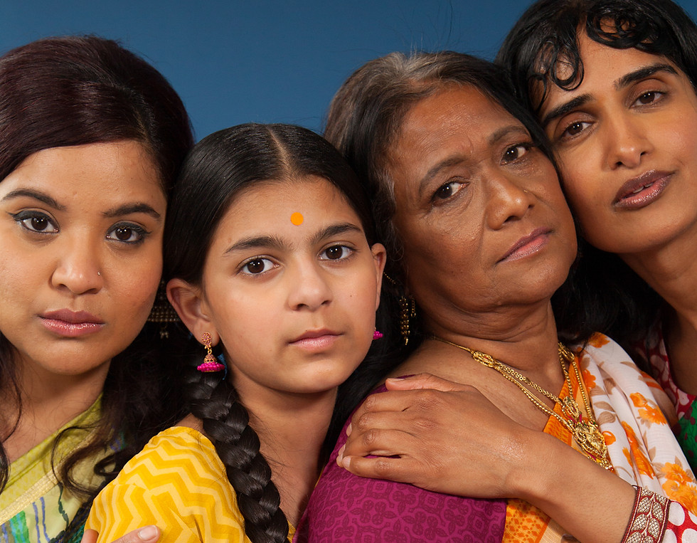 Four generations of South Asian women together, representing women's health across all life stages