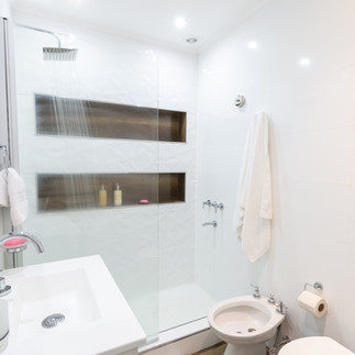 Bathroom with running shower water from a clean and efficient water softener