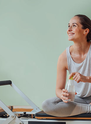 Woman Sitting on Equipment