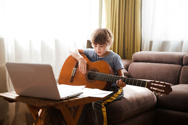 Child Playing Guitar