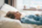 Woman Lying down listening to music
