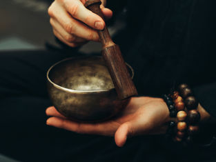 CLEANSING LUCKY CHARMS WITH SOUND FROM SINGING BOWL