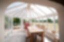 table and chairs in a conservatory