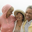 Women 50+ Laughing on Beach