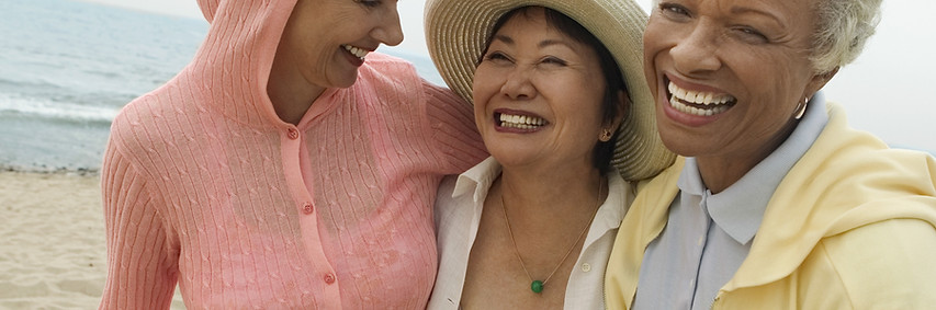 Women Laughing on Beach