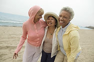 Women's Wellness Weekend, Women Laughing on Beach