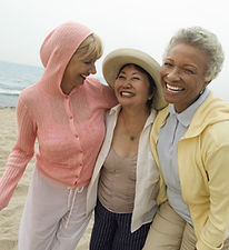 Women Laughing on Beach