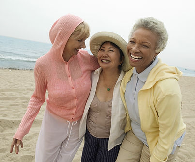 Women Laughing on Beach