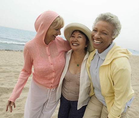 Women Laughing on Beach