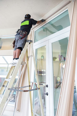 Contractor installing door