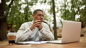 Man doing Remote Counseling on laptop