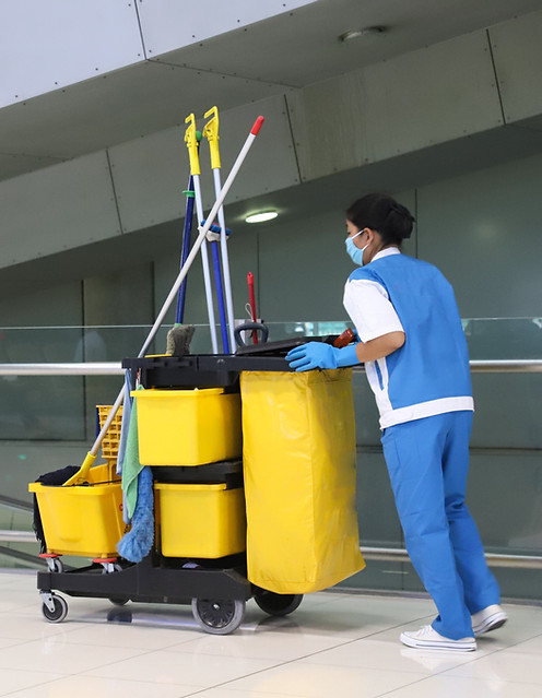 Janitor With Cleaning Cart