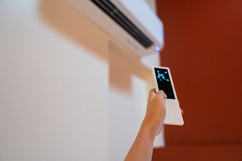 Wall-mounted split air conditioner unit in modern interior