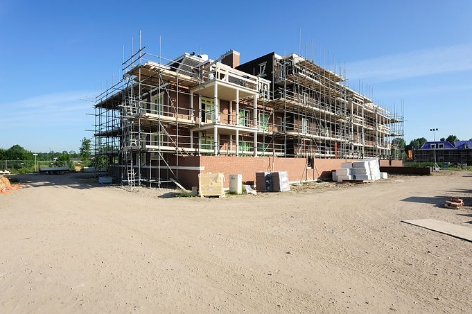 Commercial building work in progress on a contemporary development site.