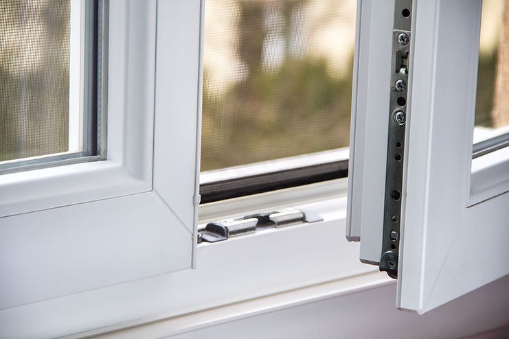 Detailed close-up of a white uPVC window frame mechanism and locking system