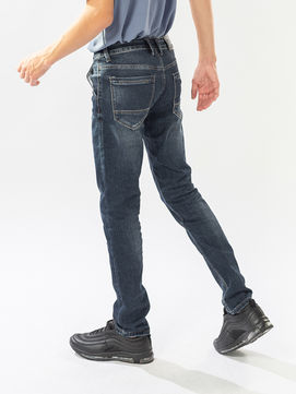Boy walking with dark denim jeans PRODUCTS and black shoes My Site
