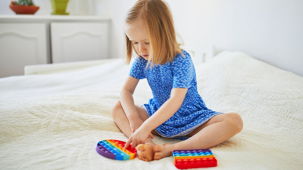 Eye-level view of a cozy quiet corner with soft pillows and dim lighting