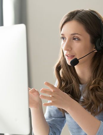 Professional remote interpreter utilising a headset during a live multilingual event.