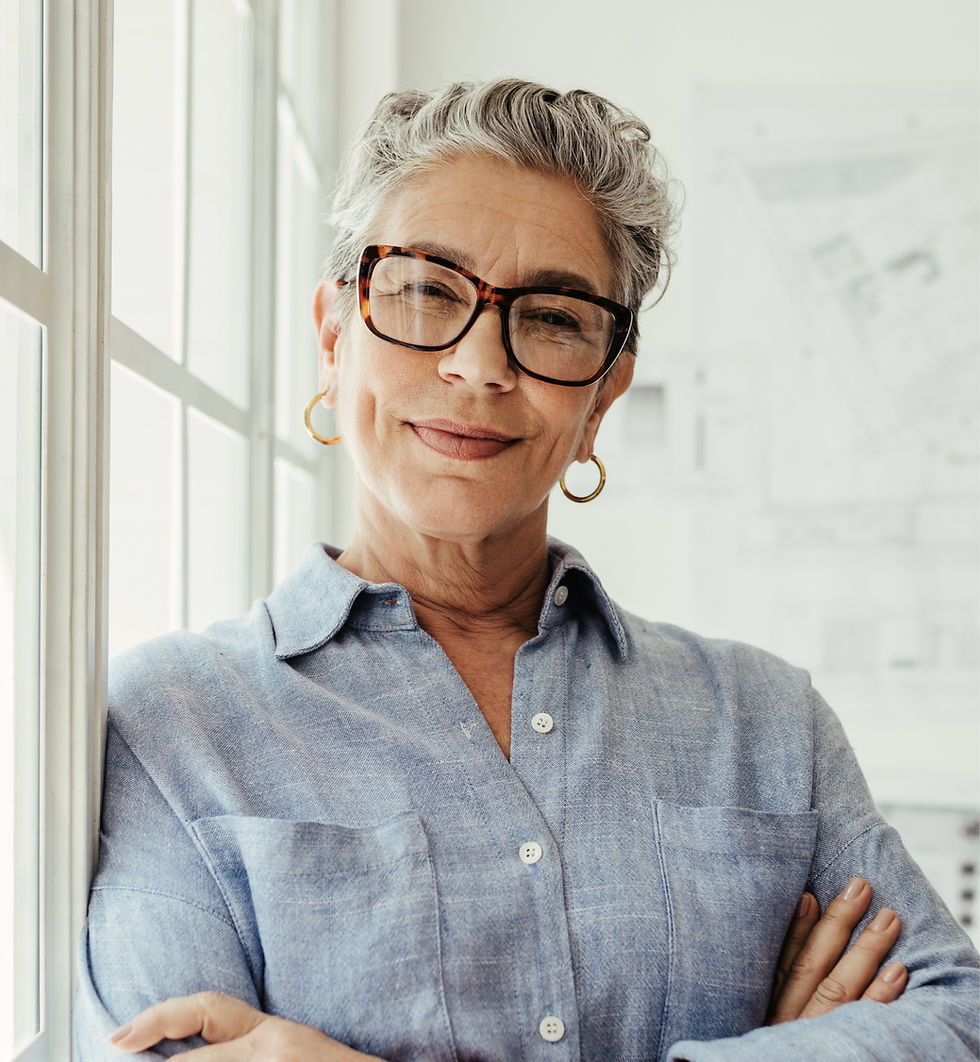Menopause health content featuring an older woman looking into the camera and smiling