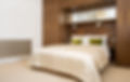 Shot of a Luxury Bedroom with Walnut Wardrobes