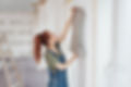 Woman Hanging Wallpaper