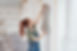 Woman Hanging Wallpaper