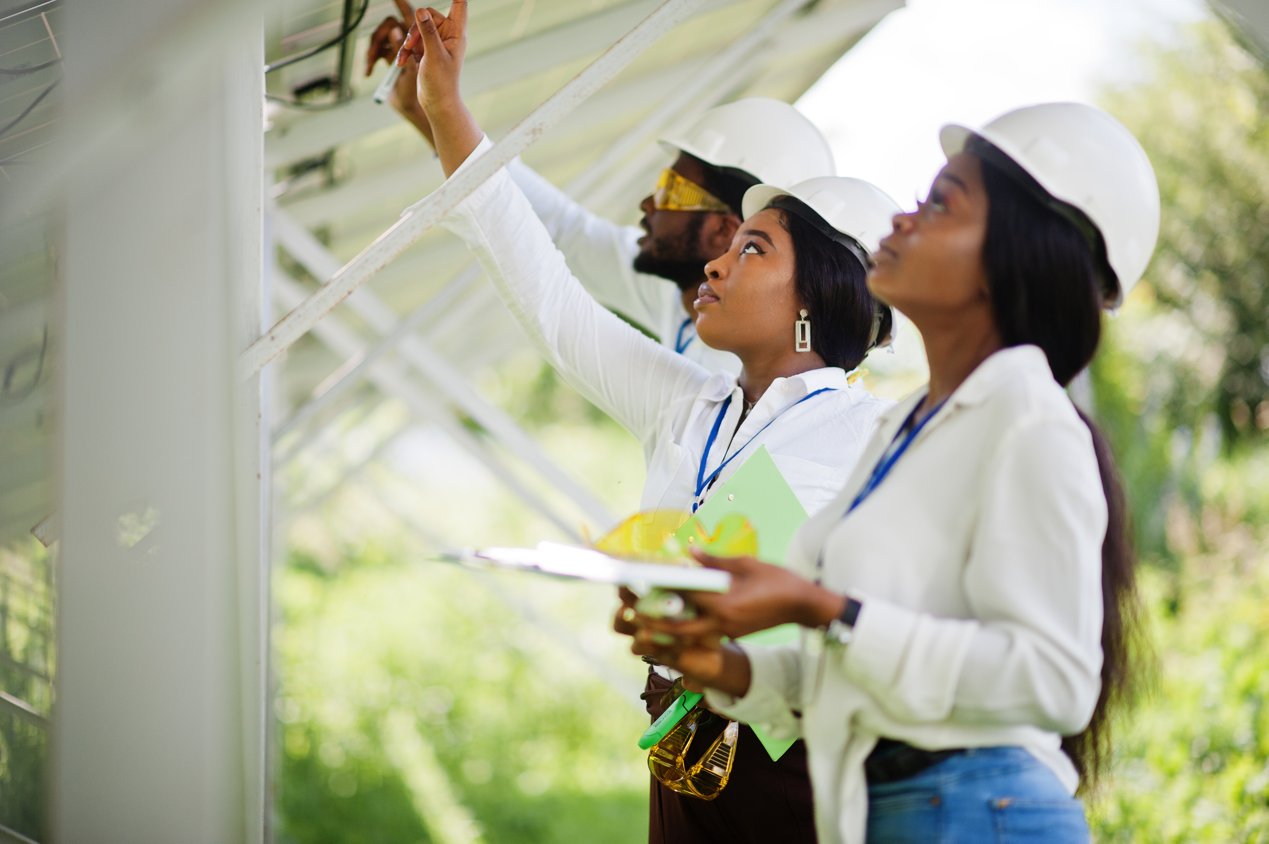 technicians on solar panels