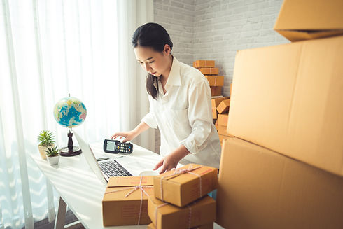 A woman registering the parcels
