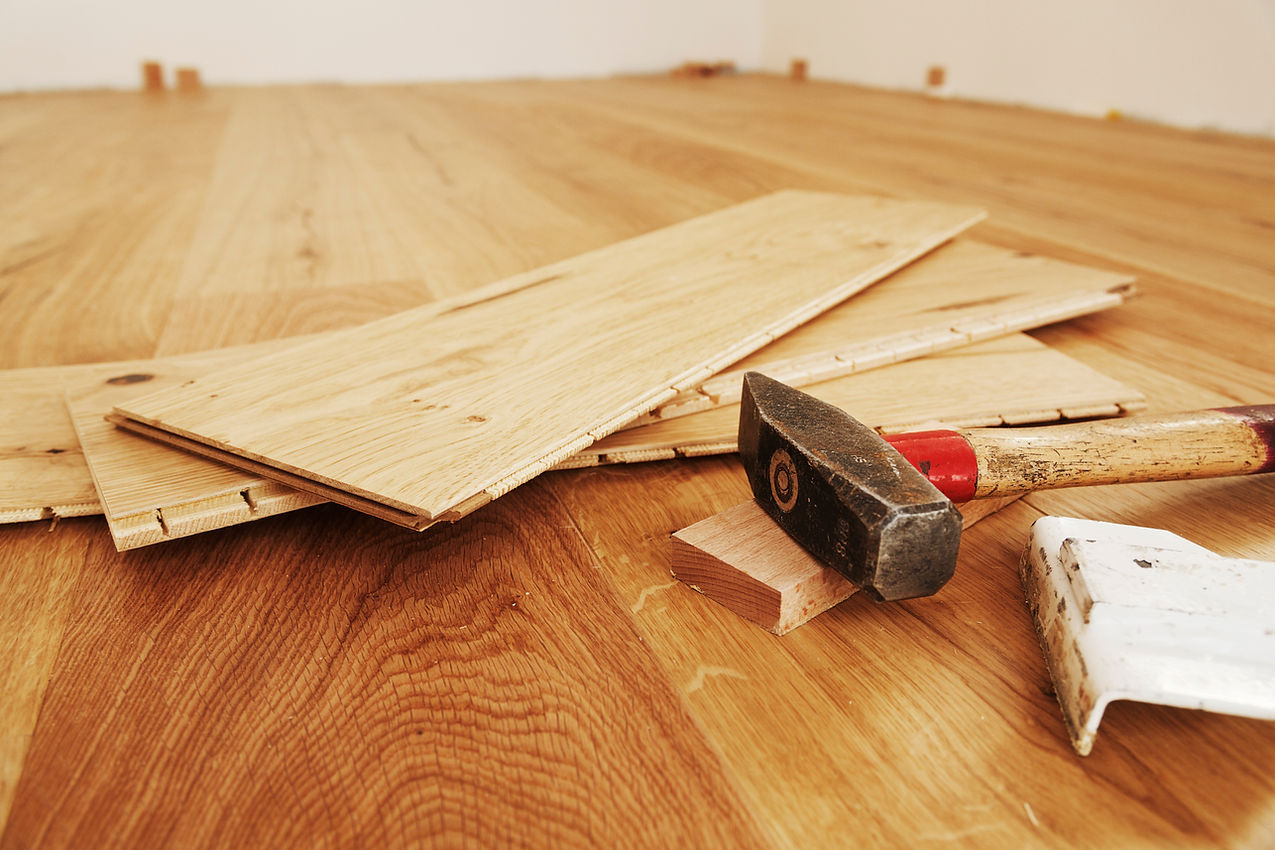 Wood flooring installation with planks