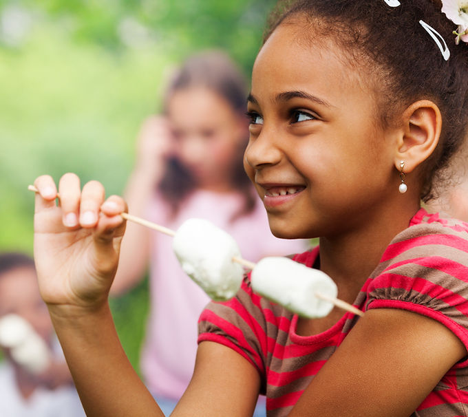 Girl Eating Marshmallows