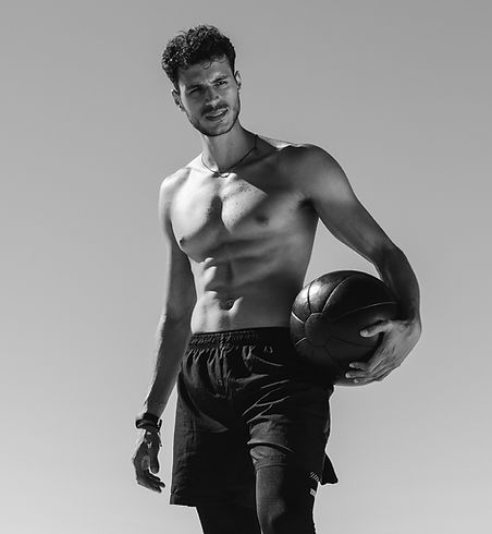 Picture of a man holding a basketball.