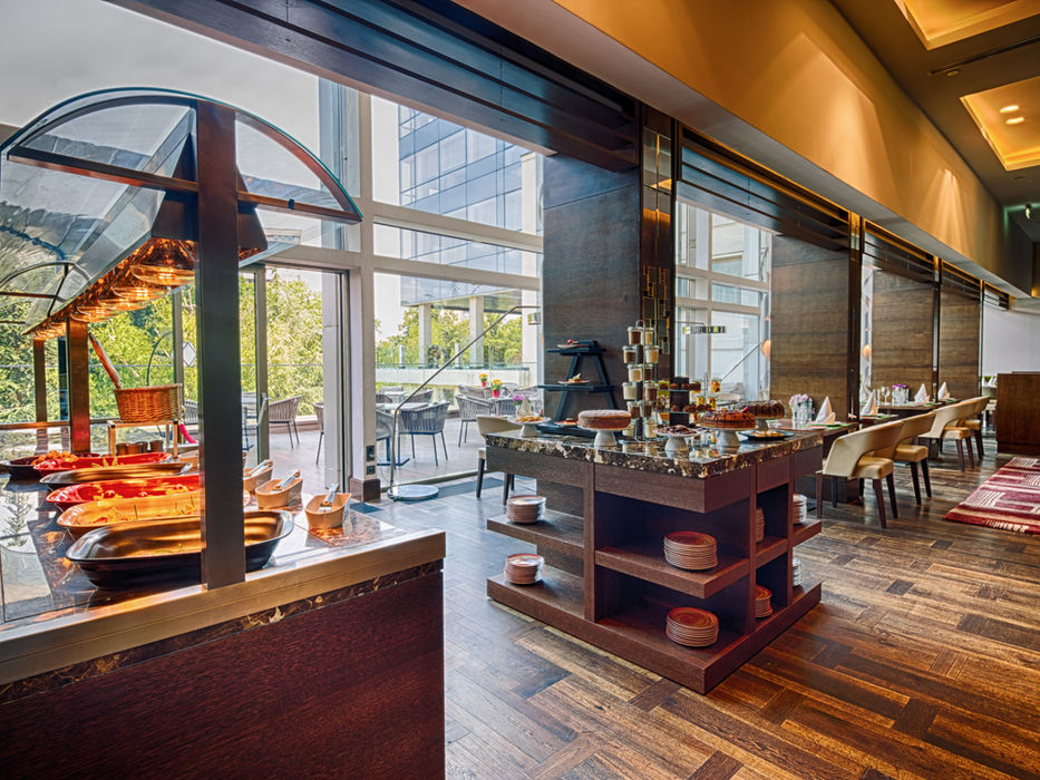 Buffet with breakfast food and seating area