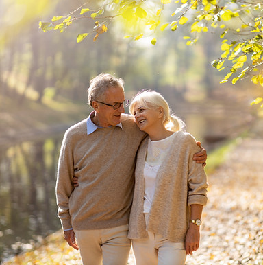 Elderly couple at atumn walk