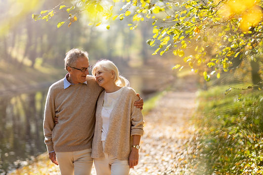 Elderly couple at atumn walk