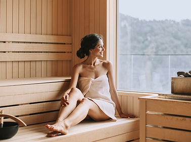 Woman Relaxing in Sauna