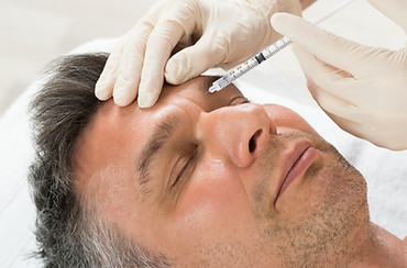 Mann får botox