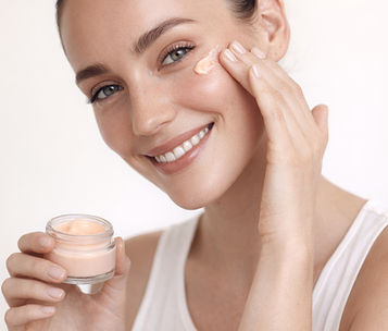 Woman Applying Cream