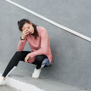 a woman appearing tired