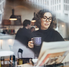 Woman Reading Newspaper