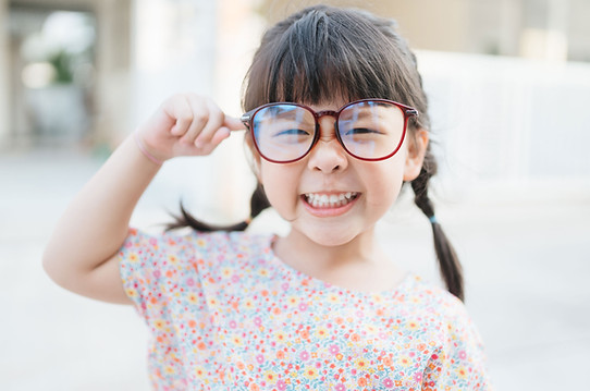 Small Child with Large Glasses