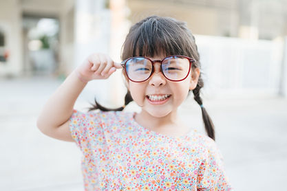 Small Child with Large Glasses