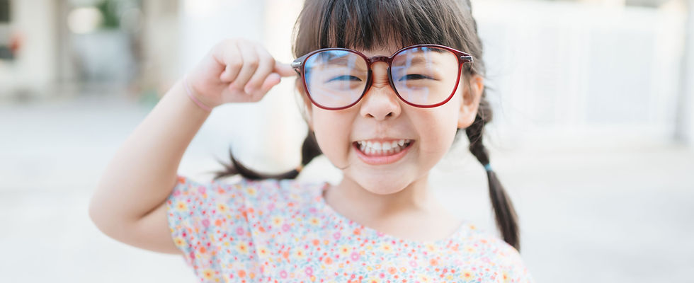 Small Child with Large Glasses