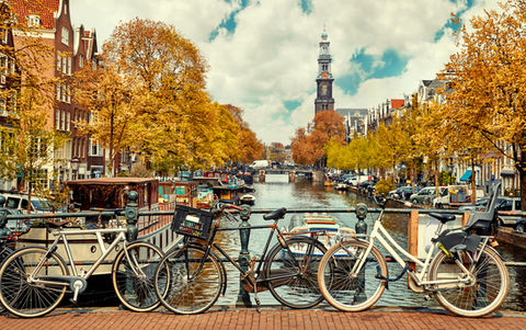 Amsterdam canal with parked bikes