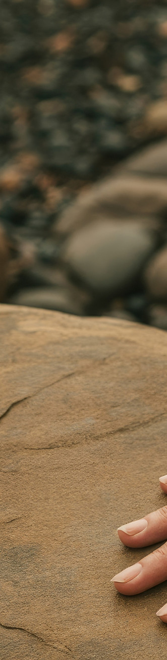 Hand Touching Rock